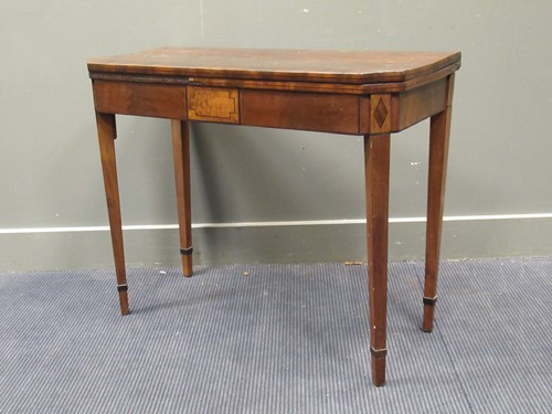 Lot 653 - A 19th century mahogany and inlaid card table,...