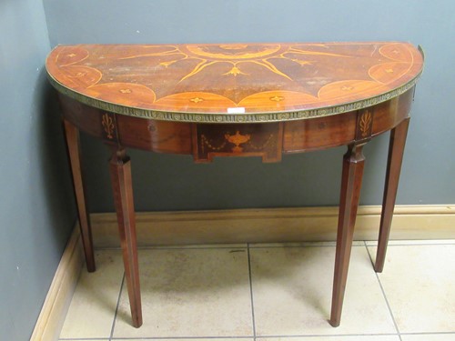 Lot 719 - A late 19th century marquetry and brass bound...