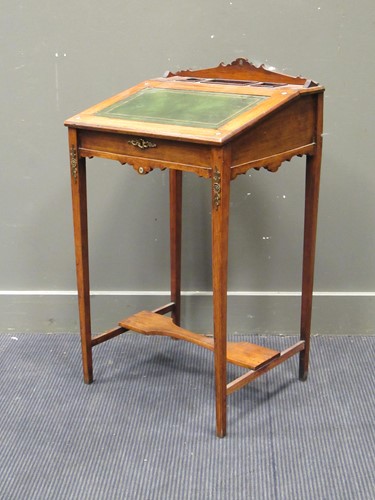 Lot 657 - A small Edwardian oak bureau decorated with...