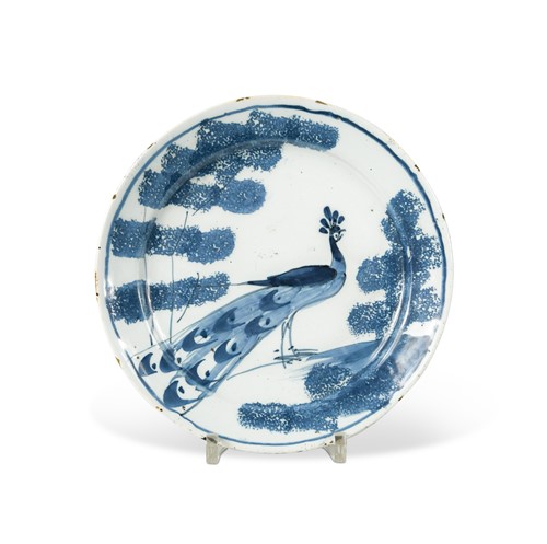 Lot 401 - A Bristol delft blue and white 'farmyard' plate, circa 1740