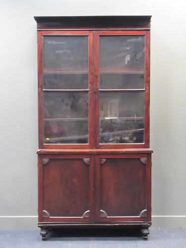 Lot 616 - An early 19th century mahogany glazed top...