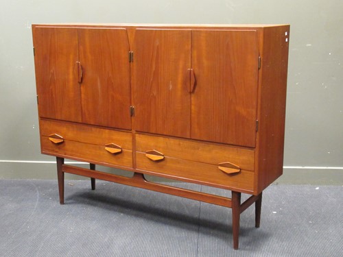 Lot 675 - A Mid-century Danish teak side cabinet by...