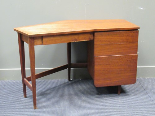Lot 677 - A 20th century teak angled desk, comprising of...