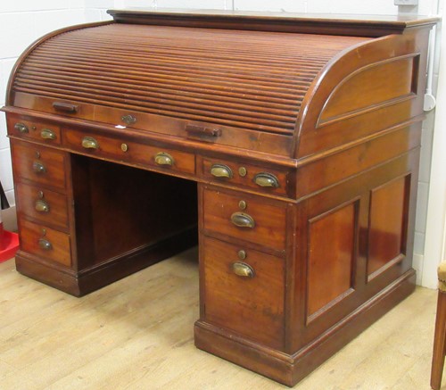 Lot 722 - A mahogany tambour front desk circa 1850, 115...