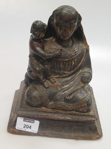 Lot 204 - A painted carved wood Madonna and Child,...