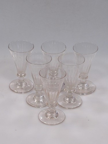 Lot 8 - A set of six George IIII ale glasses, on...