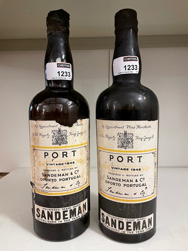 Lot 1233 - Sandeman's vintage port 1945, 2 bottles, (one...