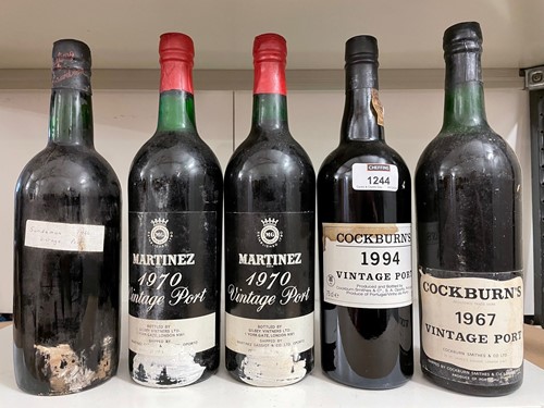 Lot 1244 - Five vintage ports. Sandeman's 1966 (top...