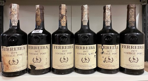 Lot 1248 - Ferreira vintage port 1977, 12 bottles (levels...