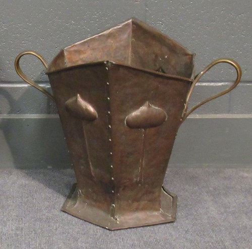 Lot 682 - An Art Nouveau copper twin handled coal bucket