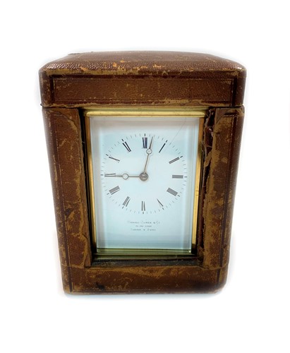 Lot 160 - A late Victorian polished brass cased carriage clock