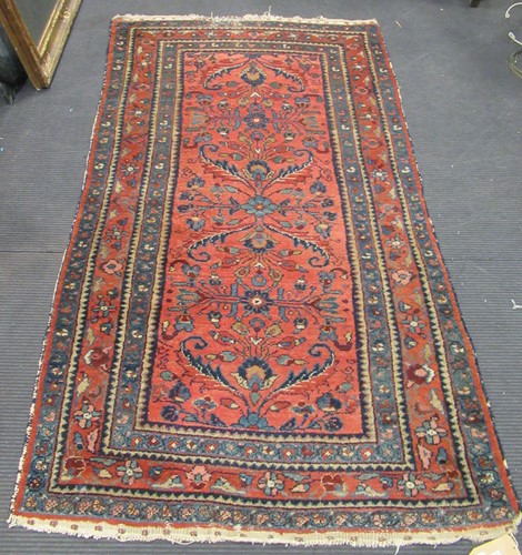 Lot 784 - A North West Persian rug with foliate designs...