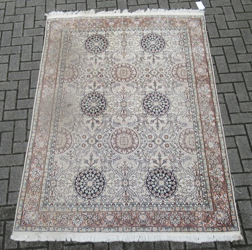Lot 771 - A Persian rug 216 x 150
