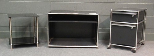 Lot 694 - A USM Haller black metal and tubular chrome...