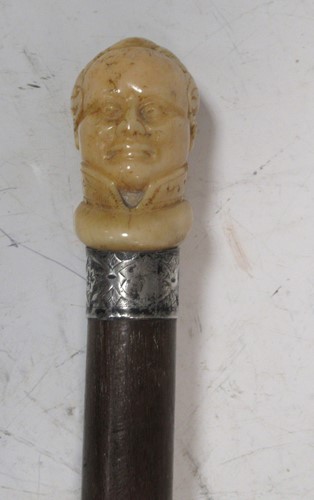 Lot 132 - A carved ivory Napoleon head walking stick...