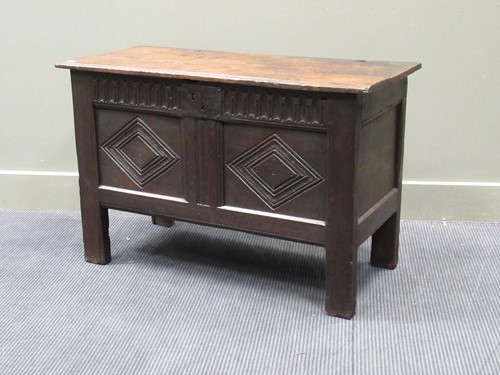 Lot 698 - A late 17th century two panel oak coffer with...