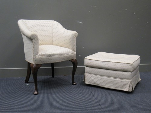 Lot 662 - An Edwardian walnut armchair on cabriole legs...
