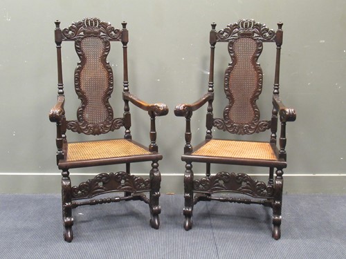 Lot 443 - A pair of Charles II style carved walnut...