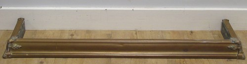 Lot 755 - A brass fender 132 x 30cm