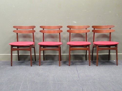 Lot 596 - Four Danish mid-century teak dining chairs...