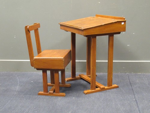 Lot 672 - A 20th century stained wood childs floor...