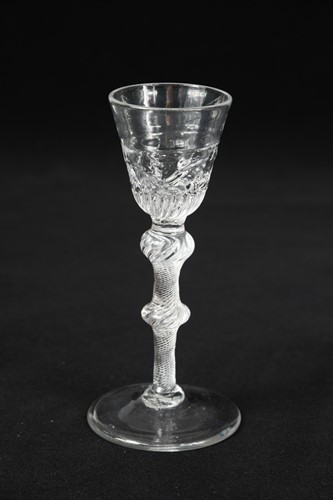 Lot 444 - A rare George II air twist wine glass, circa 1750