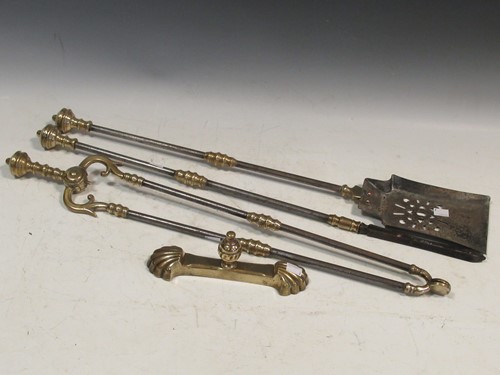 Lot 737 - A set of three Georgian steel and brass fire...