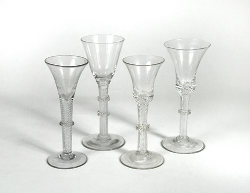 Lot 453 - A group of four air twist wine glasses, circa 1750