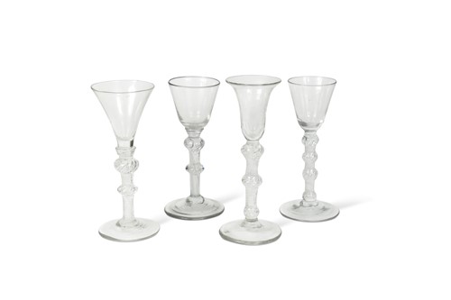 Lot 432 - Four George II air twist wine glasses, circa 1735-40