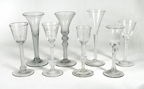 Lot 436 - A group of eight George II air twist wine glasses, circa 1740-50