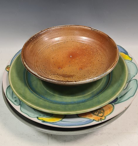 Lot 105 - A collection of studio pottery bowls and chargers