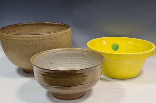 Lot 102 - A large studio pottery olive glazed bowl,...