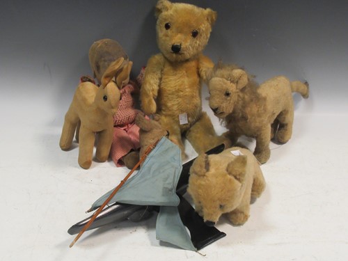 Lot 174 - An unnamed teddy bear, a puppy, a lion, a fawn...
