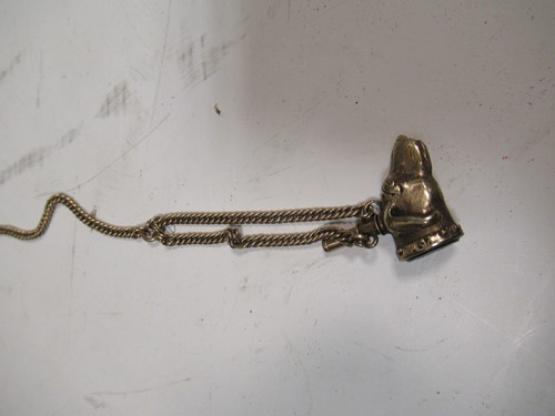 Lot 327 - A dog head fob seal and chain