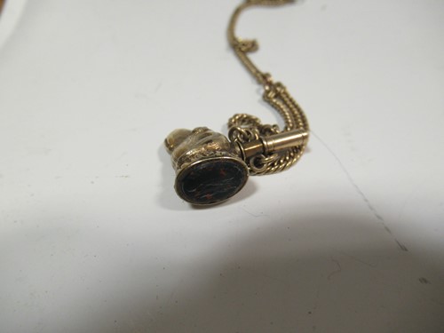 Lot 327 - A dog head fob seal and chain