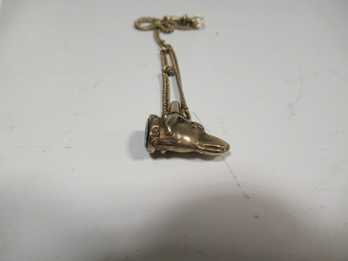 Lot 327 - A dog head fob seal and chain