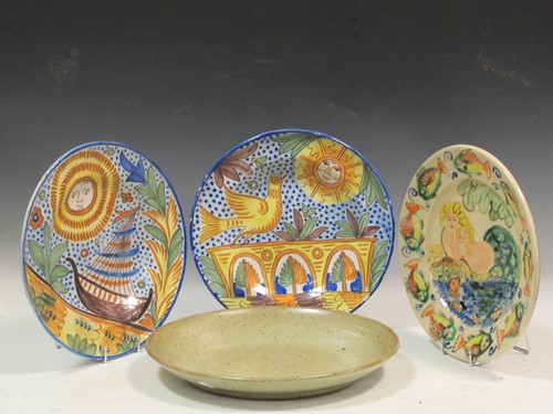 Lot 180 - A studio pottery charger painted with a...