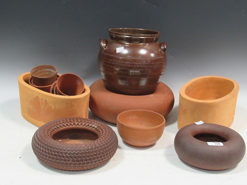 Lot 196 - A collection of earthenware storage vessels...