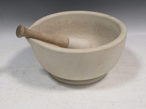 Lot 193 - A large pestle and mortar, 15cm high and 30cm...
