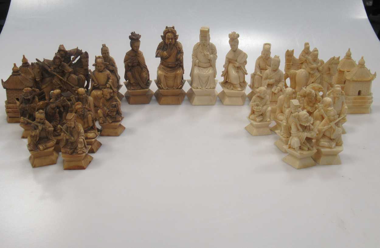 Lot 204 - An early 20th century Chinese ivory chess set,...