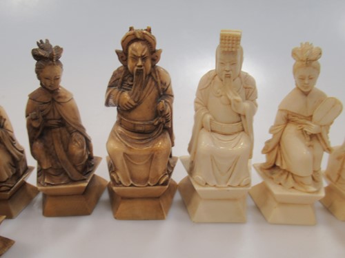 Lot 204 - An early 20th century Chinese ivory chess set,...
