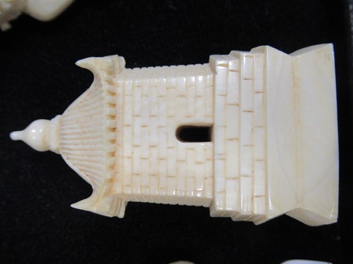 Lot 204 - An early 20th century Chinese ivory chess set,...