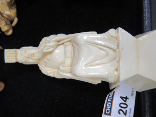 Lot 204 - An early 20th century Chinese ivory chess set,...