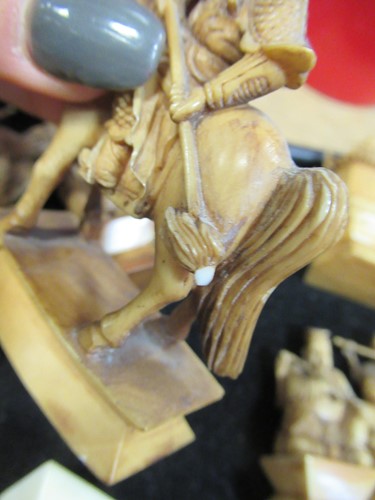 Lot 204 - An early 20th century Chinese ivory chess set,...
