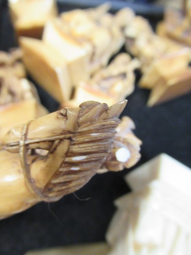 Lot 204 - An early 20th century Chinese ivory chess set,...