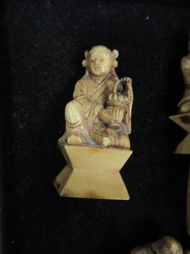 Lot 204 - An early 20th century Chinese ivory chess set,...