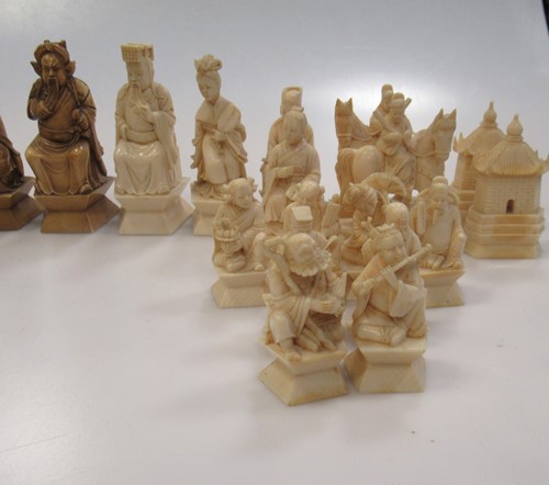 Lot 204 - An early 20th century Chinese ivory chess set,...