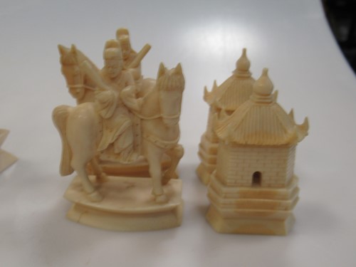 Lot 204 - An early 20th century Chinese ivory chess set,...