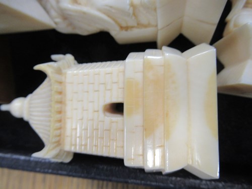 Lot 204 - An early 20th century Chinese ivory chess set,...