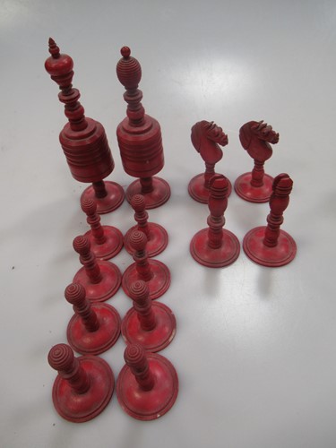 Lot 205 - A 19th century bone chess set, natural and red...